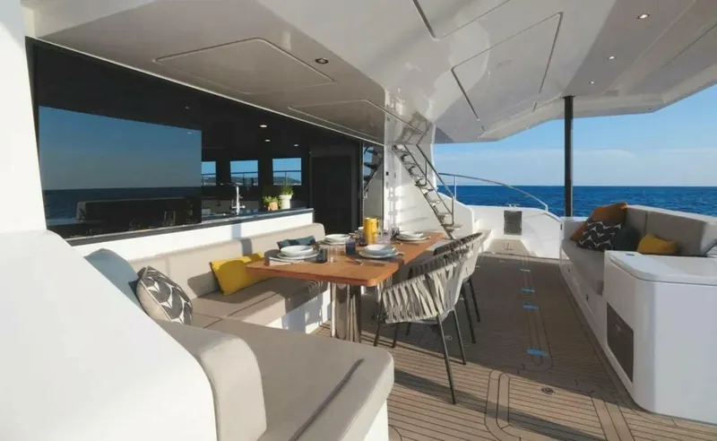 Slide: The Image of The spacious aft cockpit offers the perfect setting for sunset dining or lounging with ocean views - 5189091