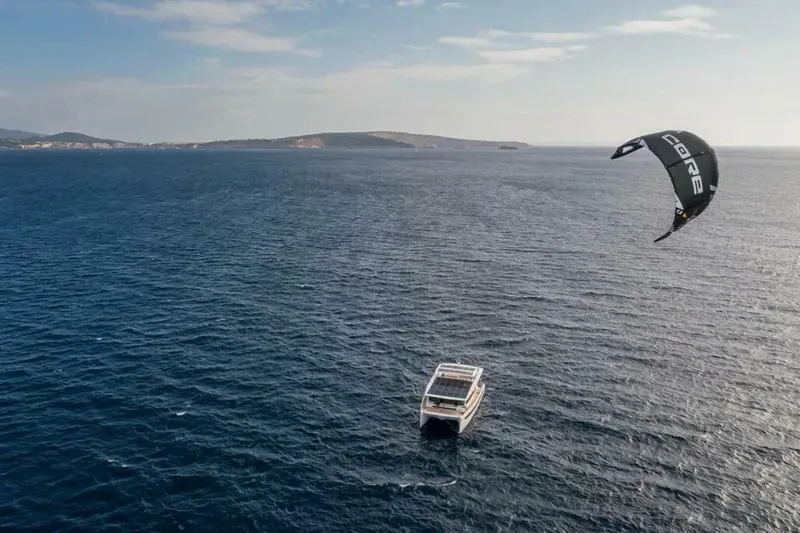 Slide: The Image of Kite Sailing System Adding the option of a fully automatic towing kite gives the SY 62 the opportunity to make use of the wind without shading the panels. The either 9m² or 12 m² sized kite flies at heights where winds are much stronger, thus being able to create up to 10x m - 5189069