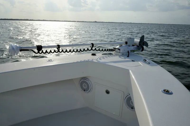 Slide: The Image of Reef Runner 23 - Bow with Trolling Motor 2024 Reef Runner 23 Center Console - 7654890