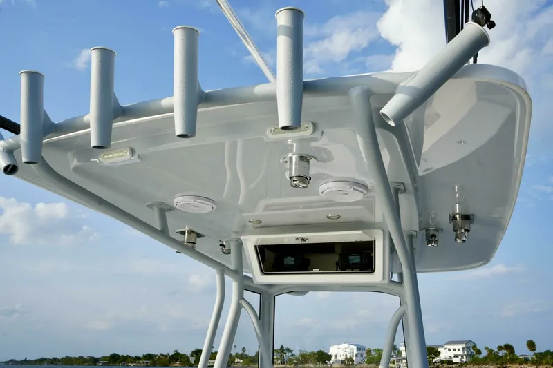 Slide: The Image of Reef Runner 23 - Rod Holders in T-Top 2024 Reef Runner 23 Center Console - 7654882