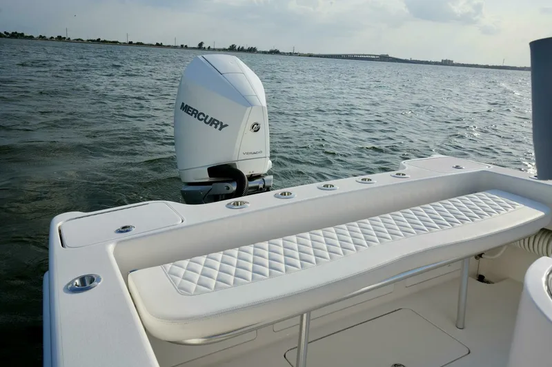 Slide: The Image of Reef Runner 23 - Aft Seating 2024 Reef Runner 23 Center Console - 7654884