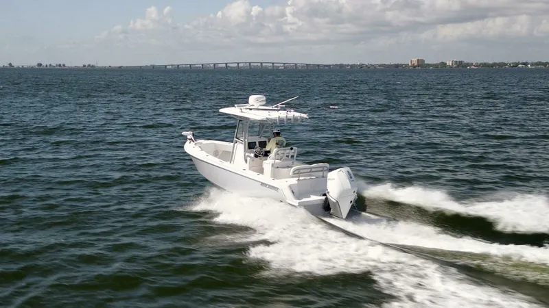 Slide: The Image of Reef Runner 23 - Profile 2024 Reef Runner 23 Center Console - 7654905