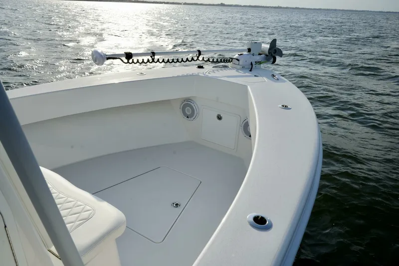 Slide: The Image of Reef Runner 23 - Bow with Trolling Motor 2024 Reef Runner 23 Center Console - 7654888