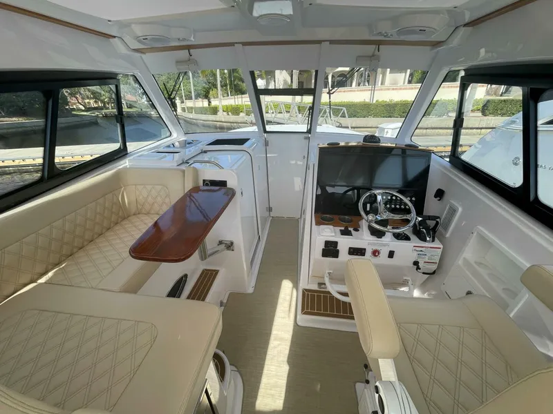 Slide: The Image of 33 Southport Miss Sue- Helm/Dinette 2022 Southport 33 320 DC Miss Sue - 5214449