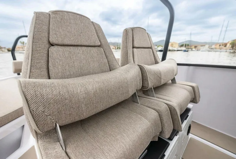 Slide: The Image of Axopar 22 T-Top at Rest in Casco Bay An Axopar 22 T-Top rests quietly on the calm blue waters of Casco Bay, captured by East Coast Yacht Sales. The sleek Nordic design and compact, versatile profile of the 22 shine through—ready for anything from a morning harbor cruise to an afternoon run a - 5715200