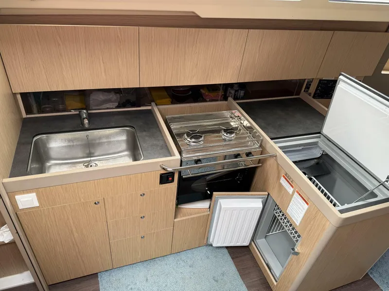 Slide: The Image of L-shaped galley Front loading fridge with countertop access - 5266766