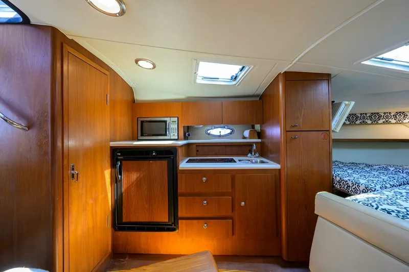 Slide: The Image of Tiara 3100 LE Black Jack - Cabin, Galley 2002 Tiara 3100 LE Black Jack - 7654625