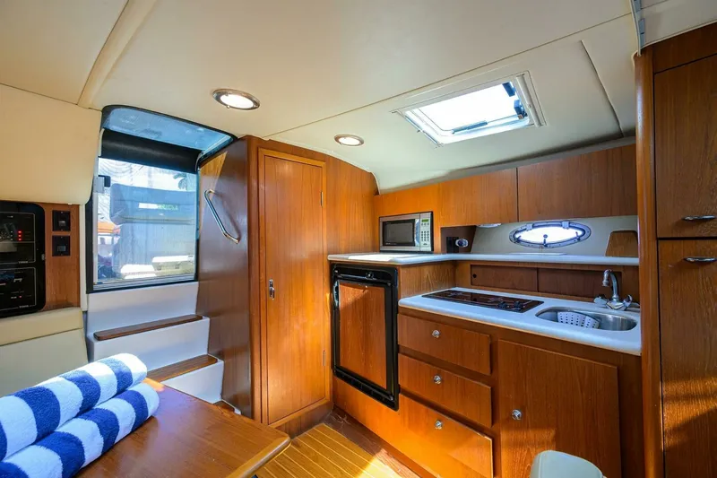 Slide: The Image of Tiara 3100 LE Black Jack - Cabin, Galley 2002 Tiara 3100 LE Black Jack - 7654626