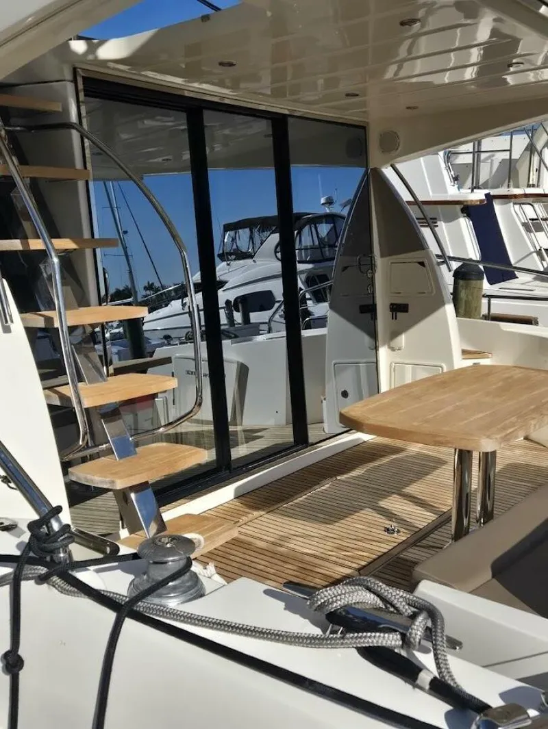 Slide: The Image of 2013 Prestige 500 Aft Deck steps to Flybridge - 5337063
