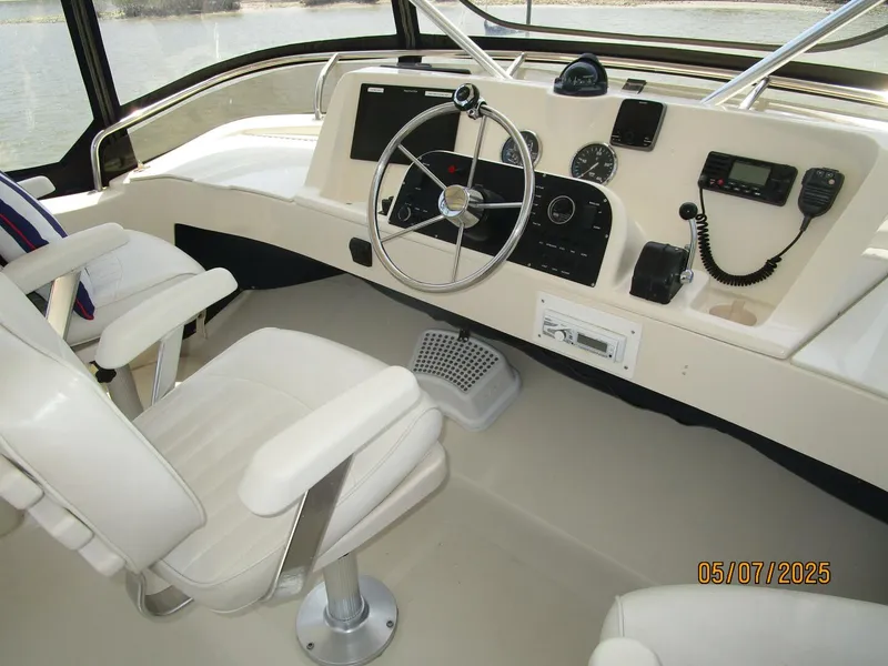Slide: The Image of 34' Mainship flybridge helm1 - 5297598