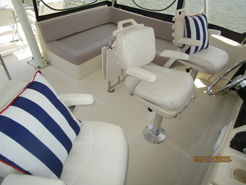Slide: The Image of 34' Mainship flybridge helmseats - 5297600