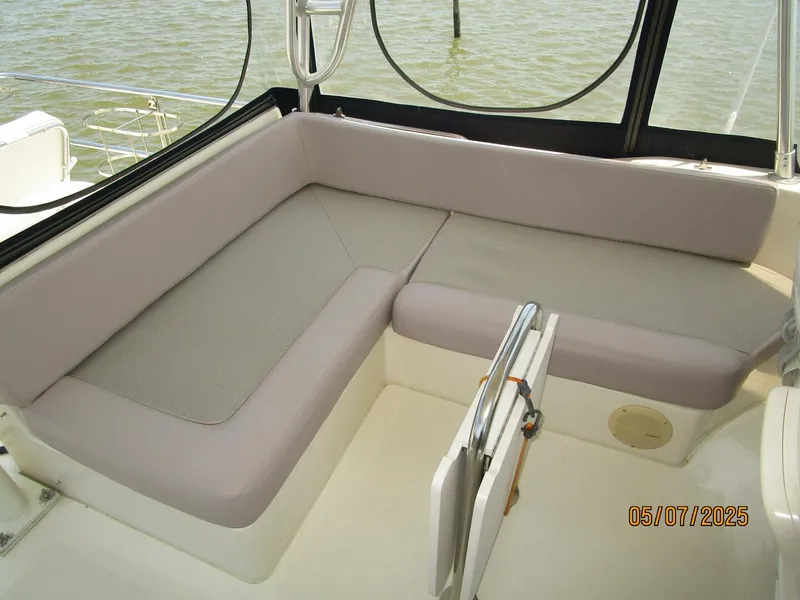Slide: The Image of 34' Mainship flybridge port seating - 5297622