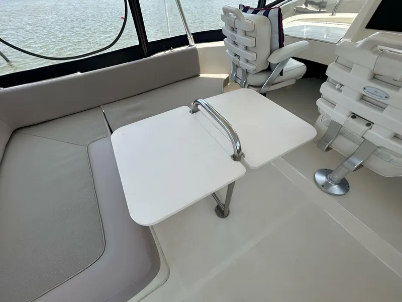 Slide: The Image of 34' Mainship flybridge table - 5297649