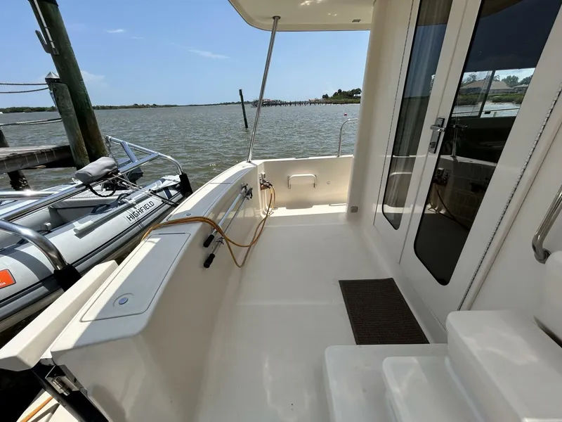 Slide: The Image of 34' Mainship aftdeck port - 5297580