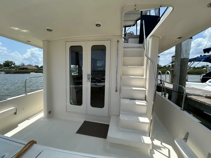 Slide: The Image of 34' Mainship aftdeck forward - 5297578