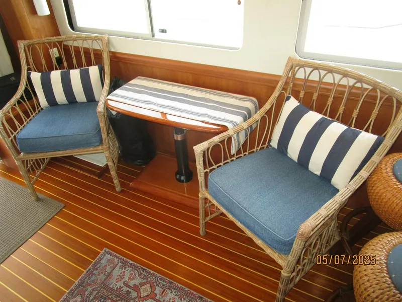 Slide: The Image of 34' Mainship salon port seating - 5297678