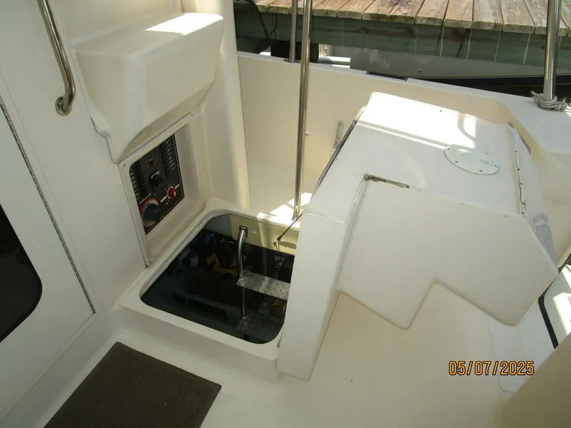 Slide: The Image of 34' Mainship engine room access - 5297593