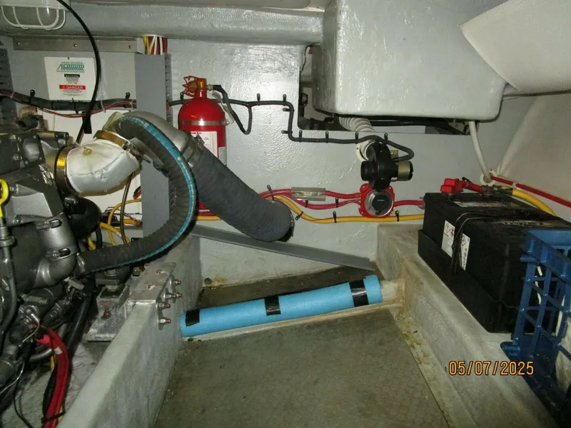 Slide: The Image of 34' Mainship engine room port aft - 5297594