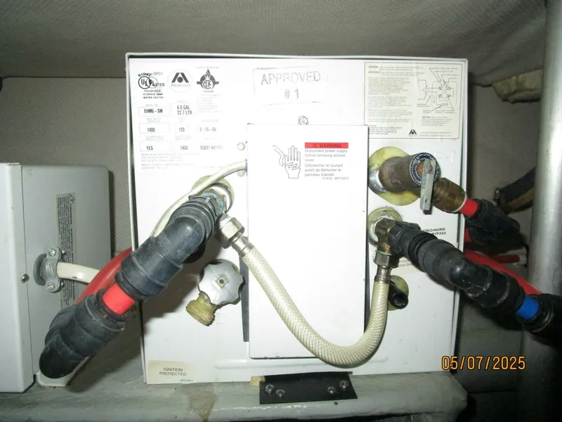 Slide: The Image of 34' Mainship water heater - 5297692