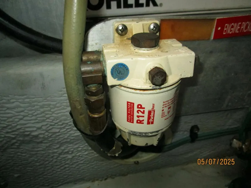 Slide: The Image of 34' Mainship generator Racor fuel filter - 5297657