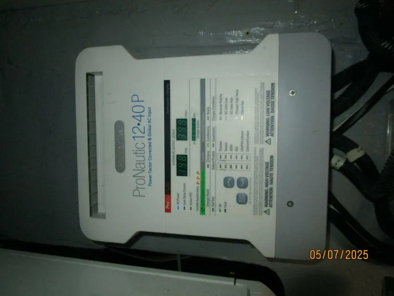 Slide: The Image of 34' Mainship battery charger - 5297590