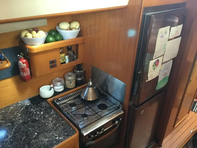 Slide: The Image of 2002 Lagoon 470 Owner Version For Sale Galley - 5305534