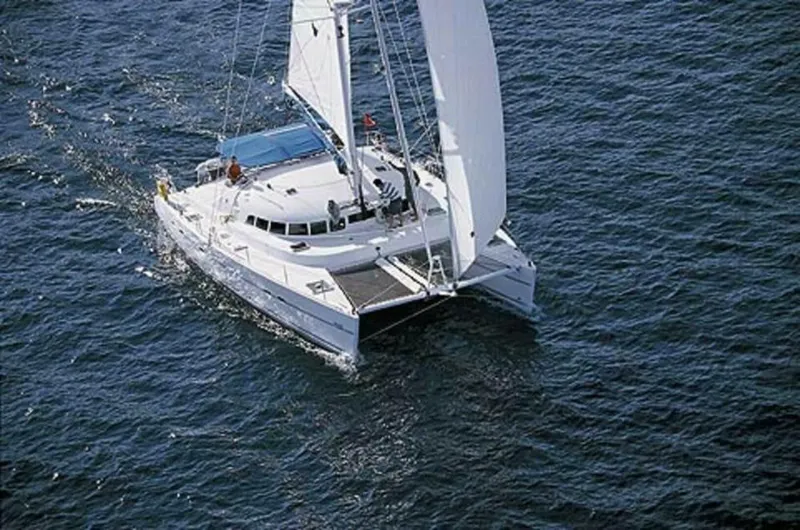 Slide: The Image of 2002 Lagoon 470 Owner Version For Sale Lagoon 470 under sail - 5305536