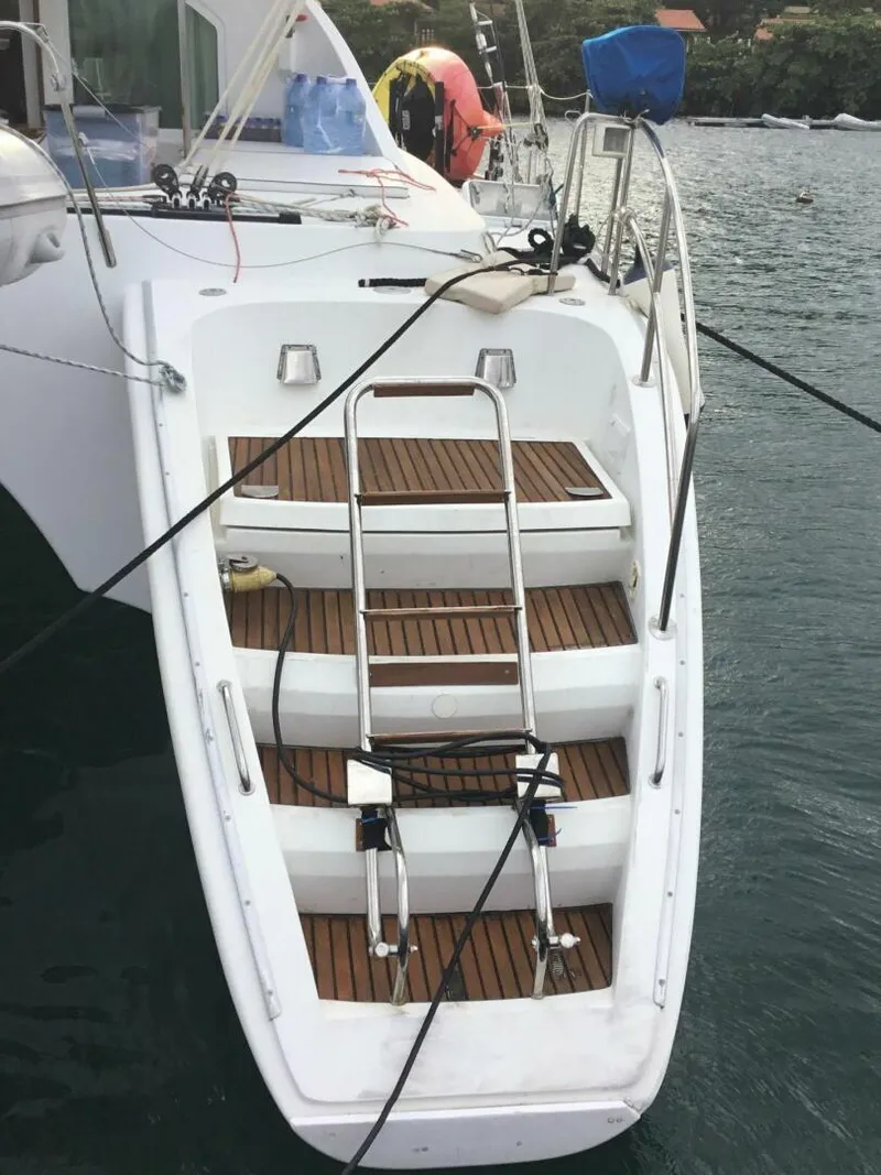 Slide: The Image of 2002 Lagoon 470 Owner Version For Sale Starboard Sugar Scoop And Custom Ladder And Rail - 5305546