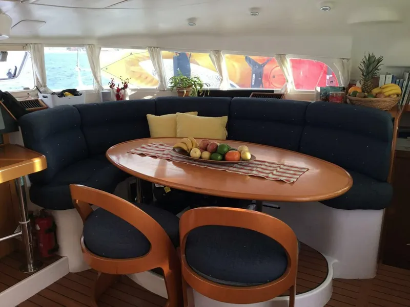 Slide: The Image of 2002 Lagoon 470 Owner Version For Sale Saloon Dining - 5305541