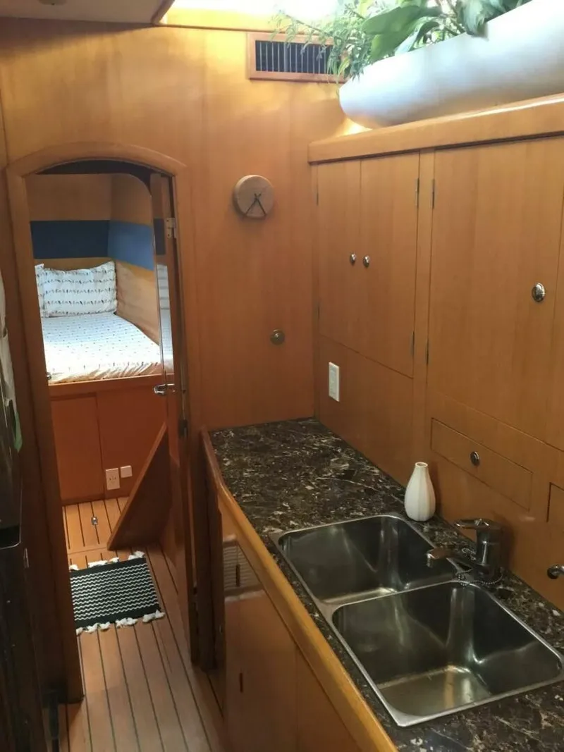 Slide: The Image of 2002 Lagoon 470 Owner Version For Sale Galley Inboard - 5305532