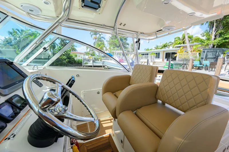 Slide: The Image of Helm 34 Pursuit Drummond Runner Nauti-Hooker - 5316282