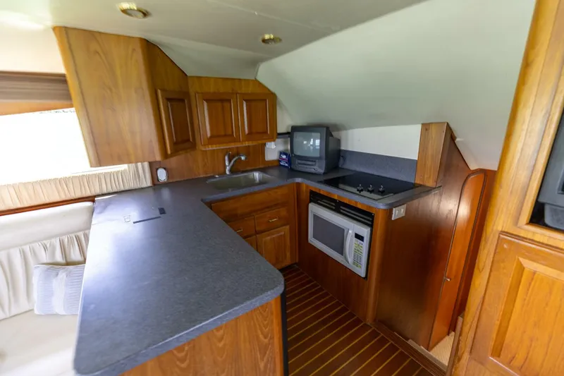 Slide: The Image of 2002 Luhrs 40 Convertible- Trigger Happy- Galley  - 5387702