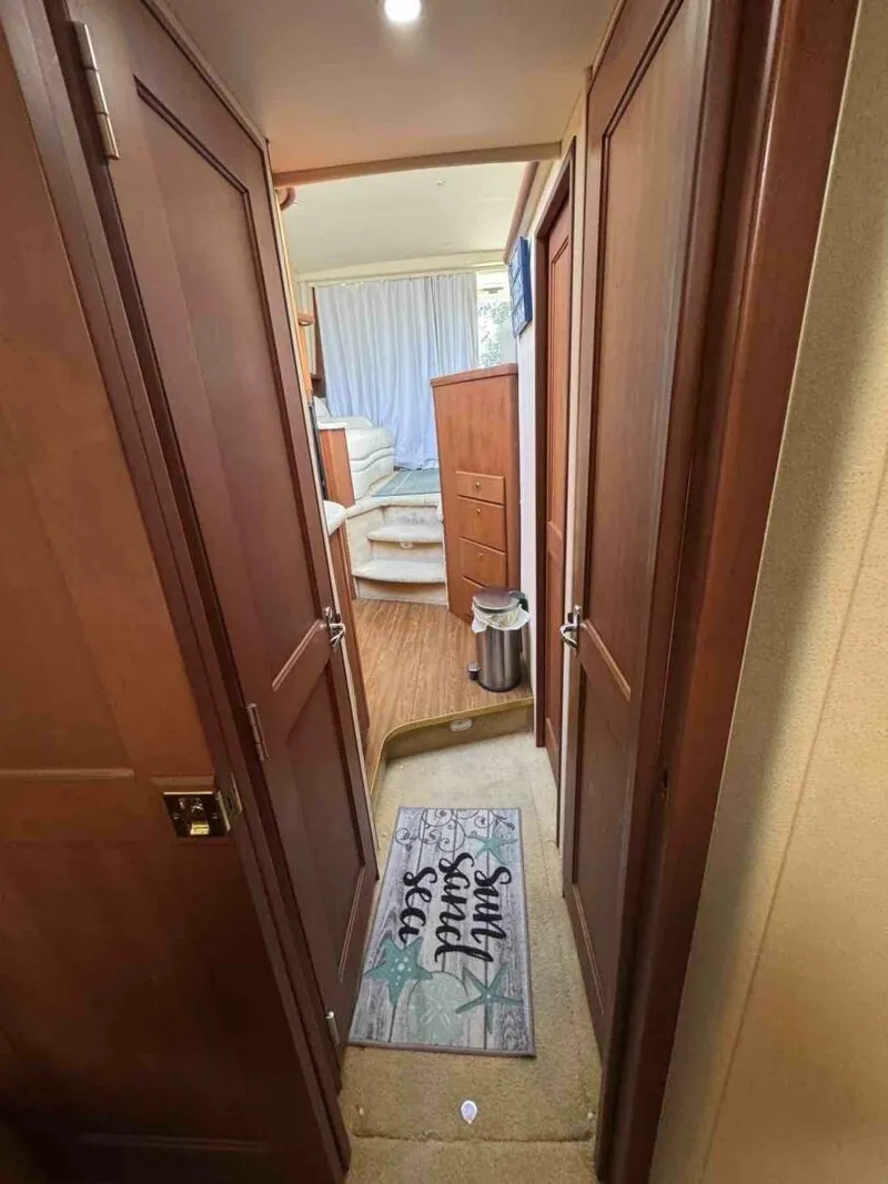 Slide: The Image of 34c Silverton  companion way from forward cabin - 5429695