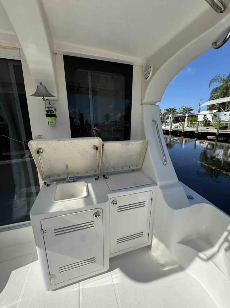 Slide: The Image of 34c Silverton fresh water sink/fish cleaning area - 5429676