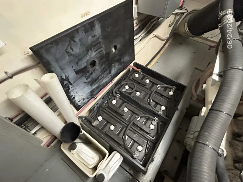 Slide: The Image of 63' Hatteras starboard engine room battery bank - 5444822