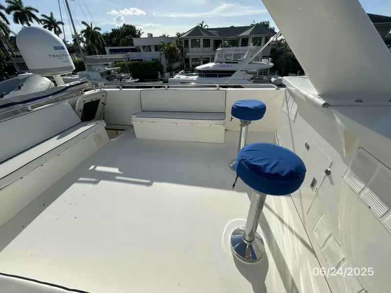 Slide: The Image of 63' Hatteras flybridge port aft - 5444695