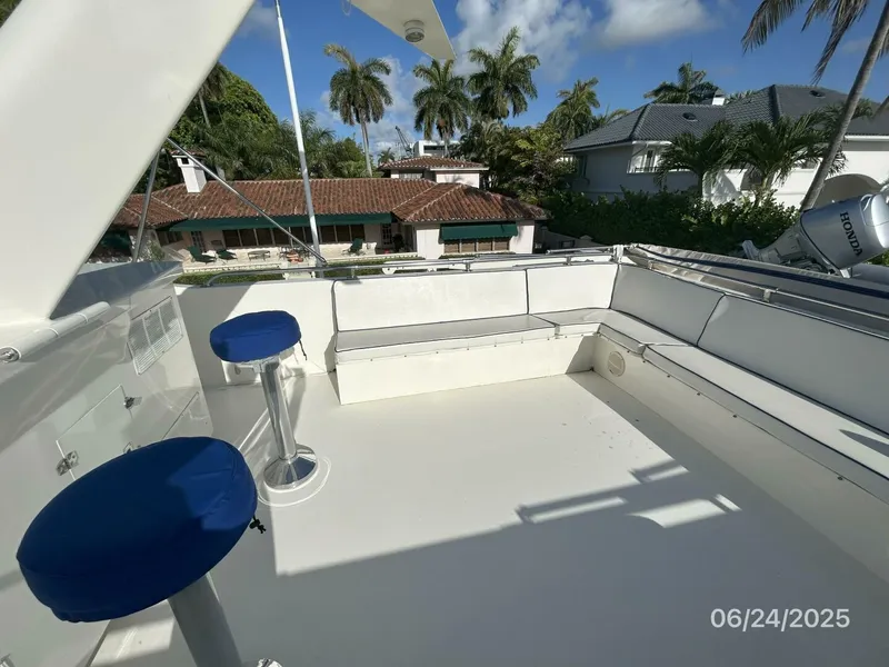 Slide: The Image of 63' Hatteras flybridge starboard aft - 5444698