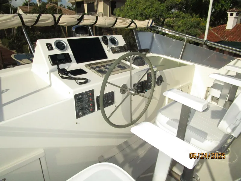 Slide: The Image of 63' Hatteras flybridge helm1 - 5444690