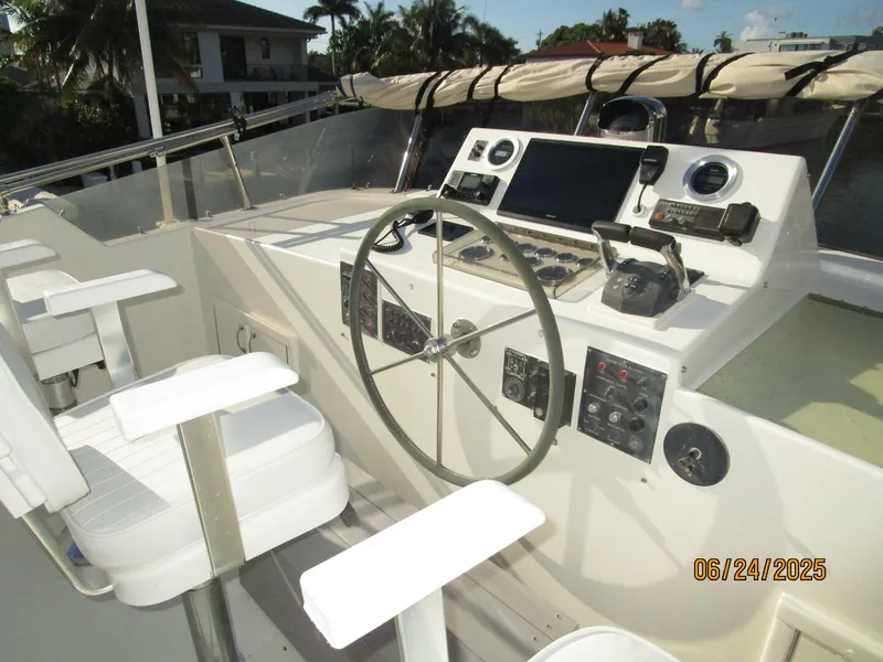 Slide: The Image of 63' Hatteras flybridge helm2 - 5444691