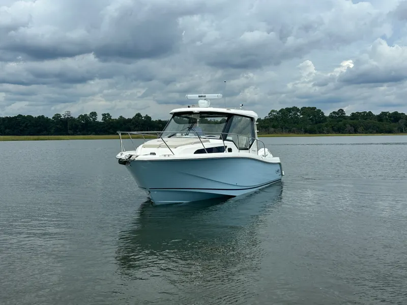 Slide: The Image of Boston Whaler 325 Conquest 2025 - 9