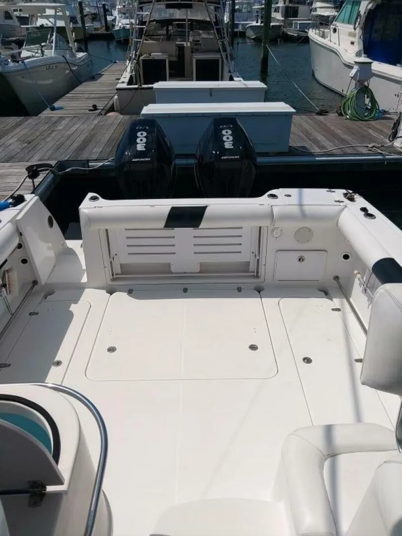 Slide: The Image of Pro-line 32 Express View of aft deck facing aft from helm. - 5530594
