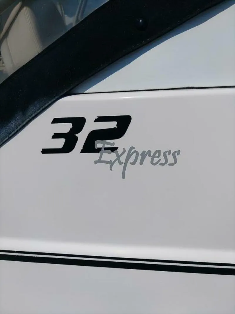 Slide: The Image of Pro-Line 32 Express View of logo of model designation on starboard side. - 5533906