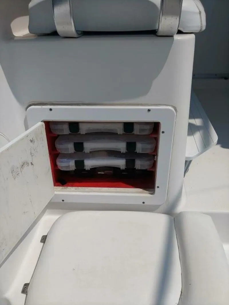 Slide: The Image of Pro-Line 32 Express Port side under seat tackle storage view. - 5533921