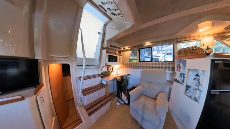 Slide: The Image of 34 ft Mainship - Salon Entrance and Corner Desk - 5490388