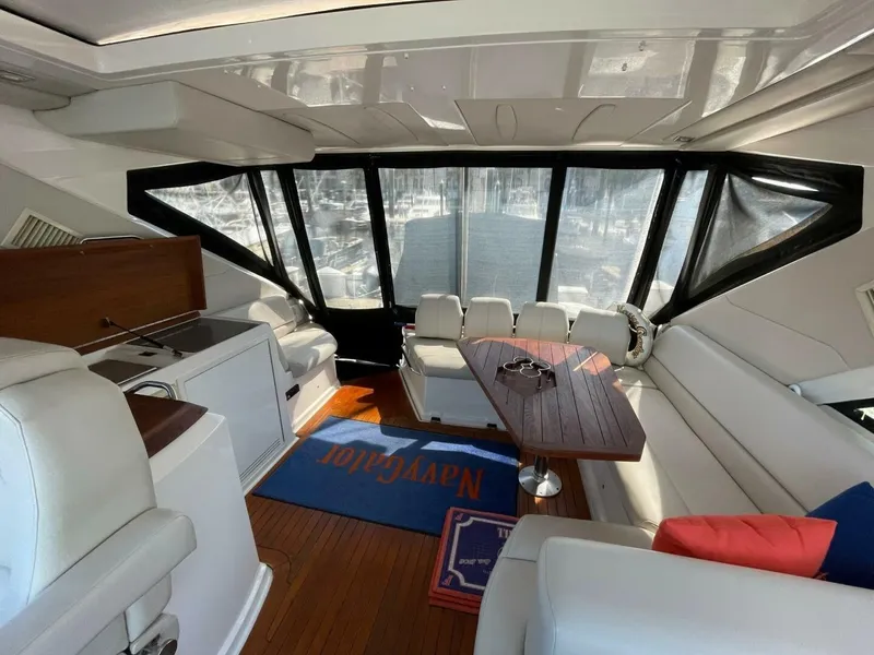 Slide: The Image of Regal 52 Sport Coupe - Helm Deck Seating 2009 Regal 52 Sport Coupe - Navygator - 5494302