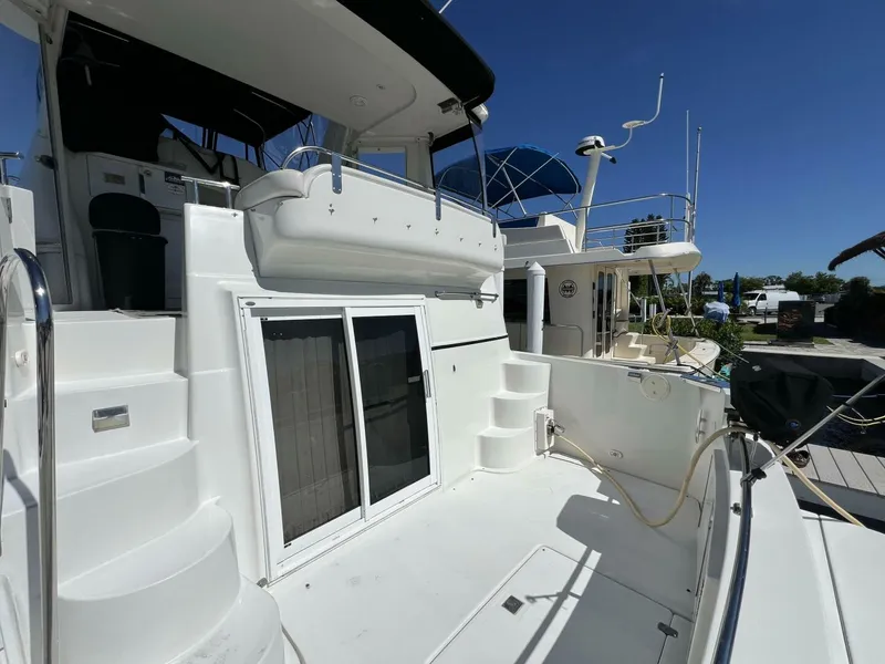 Slide: The Image of 2006 Carver 444 Cockpit Motor Yacht - Aft Deck - 5511813