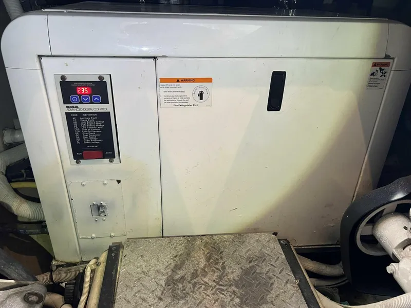 Slide: The Image of 2006 Carver 444 Cockpit Motor Yacht - Generator - 5511835