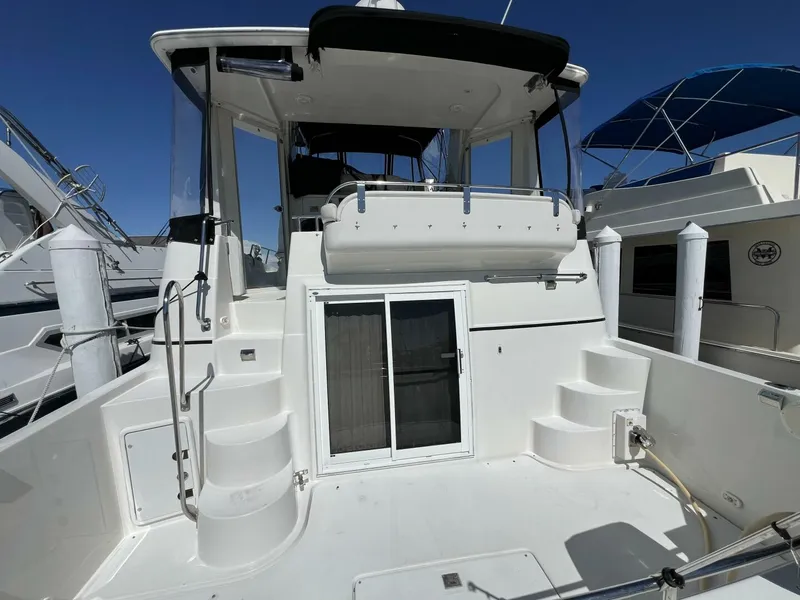 Slide: The Image of 2006 Carver 444 Cockpit Motor Yacht - Aft Deck - 5511812