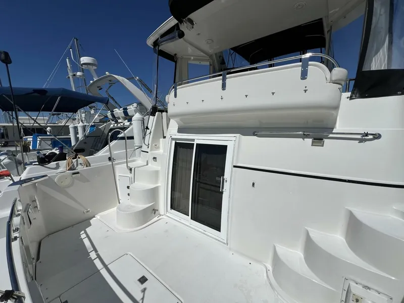 Slide: The Image of 2006 Carver 444 Cockpit Motor Yacht - Aft Deck - 5511814