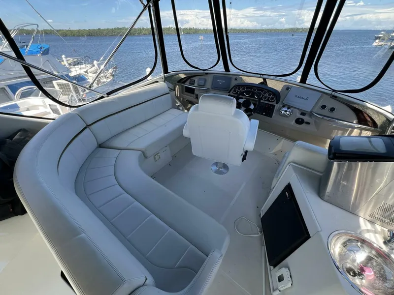 Slide: The Image of 2006 Carver 444 Cockpit Motor Yacht - Helm Seating - 5511839